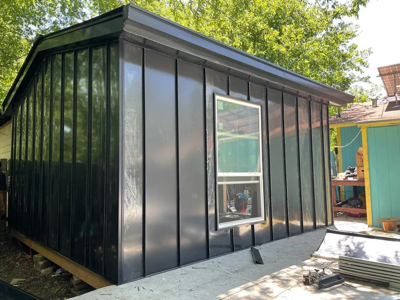 Black standing seam metal wall panels for Roof Inspection in Seminole